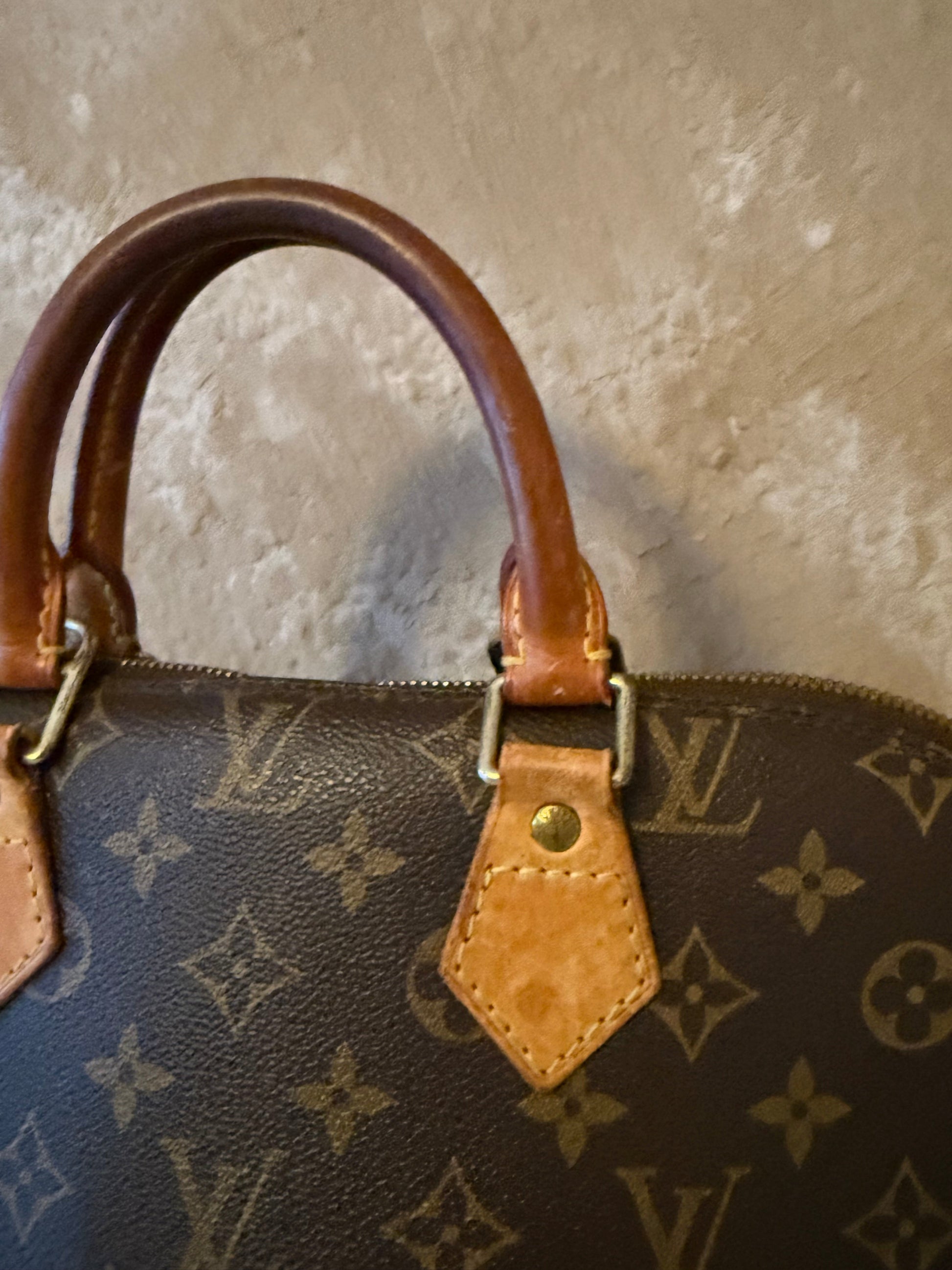 Louis Vuitton Alma - Relovedbags