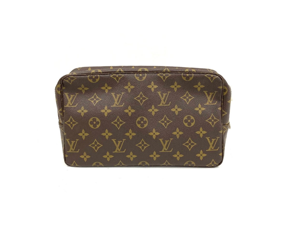 Louis Vuitton Clutch - Relovedbags